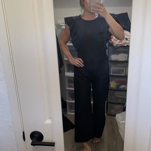 Black wide leg ruffle jumpsuit